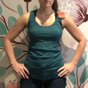 Teal tank top. New with tags